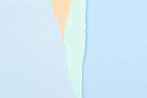 Zerwane grunge zerwane pastelowe niebieskie, zielone i beżowe geometryczne tło papieru. Kolorowe podarty papier kolaż tapety — Zdjęcie stockowe