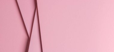 Soyut tek renkli arkaplan. Kopya alanı ile yaratıcı geometrik pastel pembe kağıt arkaplan
