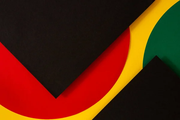 Astratto sfondo geometrico di colore nero, rosso, giallo, verde. Storia nera Mese sfondo con spazio di copia per il testo — Foto Stock