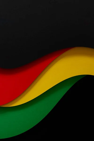 Abstrato geométrico preto, vermelho, amarelo, cor verde papel de fundo. Black History Mês cor de fundo com espaço de cópia para texto — Fotografia de Stock