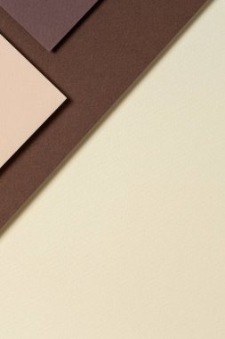 Bej ve kahverengi tonlu soyut renk kağıtları geometri kompozisyonu