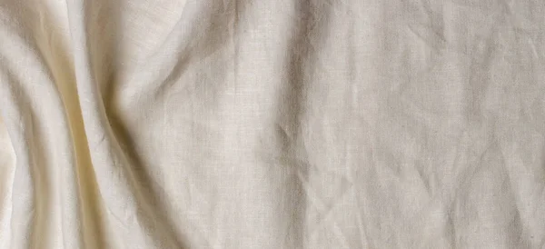 Білий збитий тканинний фон з текстури лляної тканини. Натуральний тло з білизни органічного еко текстилю полотна. Вид зверху — стокове фото
