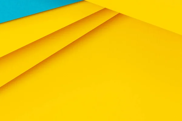 Αφηρημένο έγχρωμο φόντο χαρτί. Ελάχιστα γεωμετρικά σχήματα και γραμμές σε ανοιχτό μπλε και κίτρινο χρώμα — Φωτογραφία Αρχείου