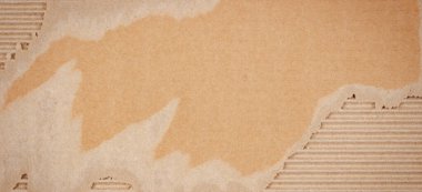 Yırtık kenarlı kahverengi karton. Karton ambalaj ağı dokusu arka planı. Üst görünüm, alanı kopyala