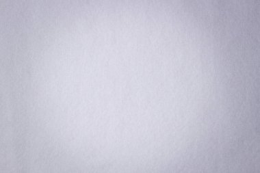 White color felt textile fabric material texture background. Abstract monochrome felt background. Top view