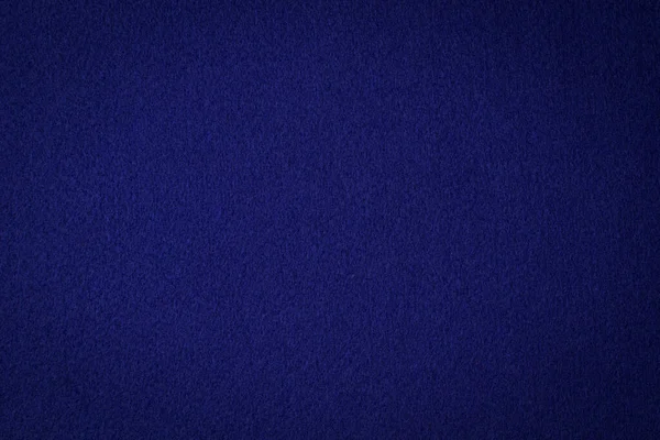 Azul marinho cor feltro tecido material textura fundo. Abstrato monocromático cor azul escuro feltro fundo — Fotografia de Stock