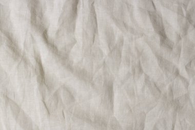Soyut keten kumaş dokusu arka planı. Buruşmuş beyaz doğal keten organik eko tekstil tuval arka planı. Üst görünüm