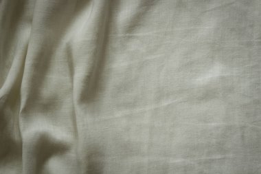 Beyaz buruşmuş kumaş dokusu arka planı. Doğal keten organik eko tekstil tuval arka planı