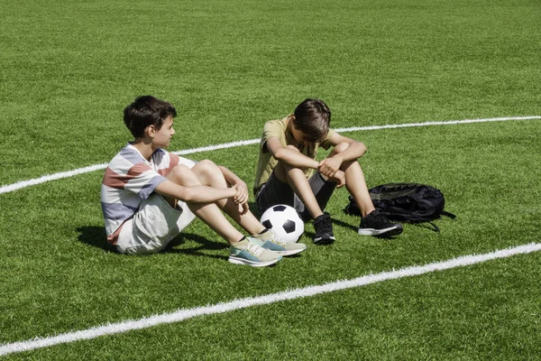 Teenage Boy Comforting Consoling Upset Sad Friend School Stadium Education — Foto de Stock