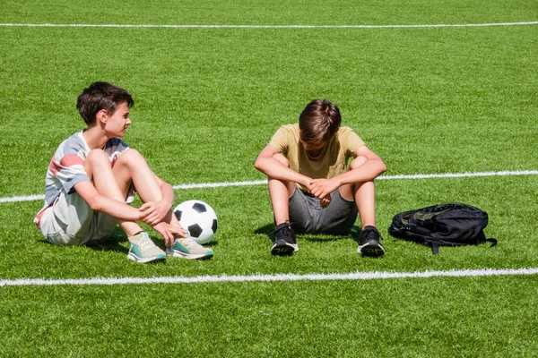 Children Talking School Stadium Outdoors Teenage Boy Comforting Consoling Upset — ストック写真