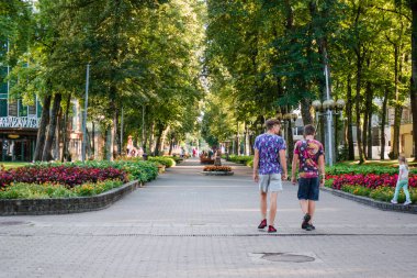 Druskininkai, Lithuania, August 11, 2022: View to main pedestrian street Vilnius alley. Druskininkai is spa resort with health promotion, recreation, active lifestyle and entertainment.