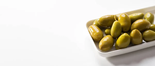 Green Pickled Olives White Background Banner Space Text — стоковое фото
