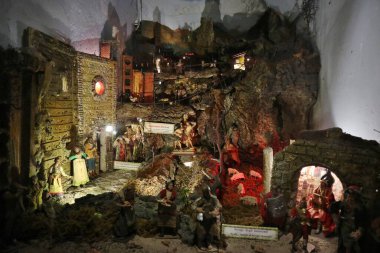 Naples, Campania, Italy - December 7, 2021: Neapolitan nativity scene on display in the Church of San Nicola alla Carit clipart