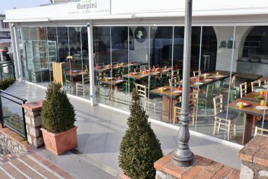 Anacapri, Campania, Italy - March 12, 2022: Due Pini restaurant from the steps of Piazza della Vittoria