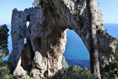 Capri, Campania, Italy - March 13, 2022: Rock formation of the Arco Naturale