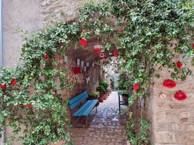 Oratino, Molise, Italy - July 13, 2022: Glimpse of the Vicolo del Bacio from Via Vittorio Emanuele