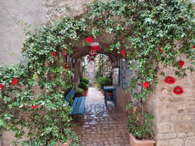 Oratino, Molise, Italy - July 13, 2022: Glimpse of the Vicolo del Bacio from Via Vittorio Emanuele