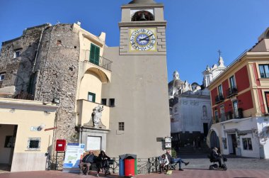 Capri, Campania, Italy - March 11, 2022: 17th-century bell tower, also known as the Clock Tower, overlooking the square