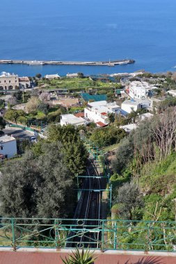 Capri, Campania, Italy - March 11, 2022: Glimpse of the funicular from the belvedere of the piazzetta