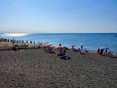 Vietri sul Mare, Campania, Italy - September 7, 2021: View of the free beach from the Bar da Gio on the promenade of Via Petrarca