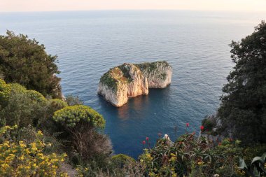 Capri, Campania, Italy - March 11, 2022: Scoglio del Monacone from the Via Pizzolungo path