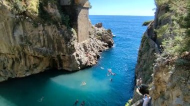 Furore, Campania, Italy - September 5, 2022: Overview of the Fiordo di Furore beach from the access path of Via Antonello da Capua