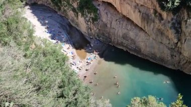 Furore, Campania, Italy - September 5, 2022: Overview of the Fiordo di Furore beach from the access path of Via Antonello da Capua