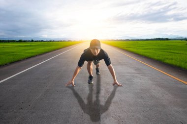 Sportman get ready on starting on the road.Start line on the highway 