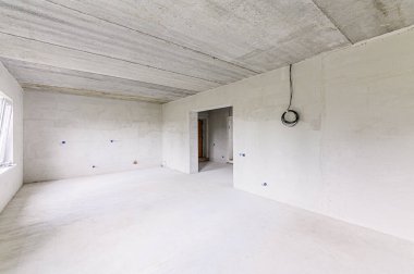 Russia, Moscow- May 15, 2020: interior room apartment rough repair for self-finishing. interior decoration, bare walls of the premises, stage of construction