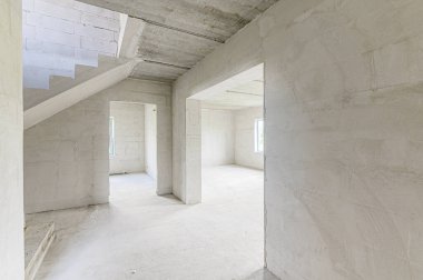Russia, Moscow- May 15, 2020: interior room apartment rough repair for self-finishing. interior decoration, bare walls of the premises, stage of construction