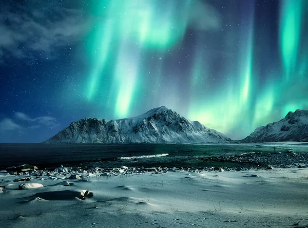 Aurora Borealis Northern Lights Snow Mountain Range Coastline Skagsanden Beach — Φωτογραφία Αρχείου