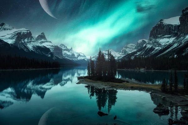 Fantastic landscape of Spirit Island with Aurora Borealis over Canadian Rockies and crescent moon on Maligne lake at Jasper national park, AB, Canada