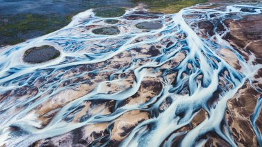 Aerial view of abstract glacier rivers pattern flowing on Icelandic Highlands in Iceland
