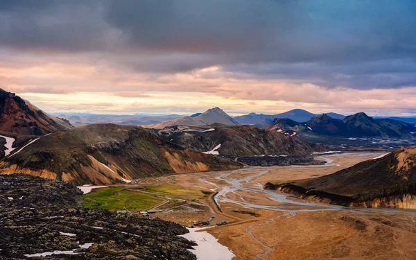 Spectacular scenery from Blahnjukur trail with volcanic mountain and lava field in Icelandic highlands on Landmannalaugar at Iceland