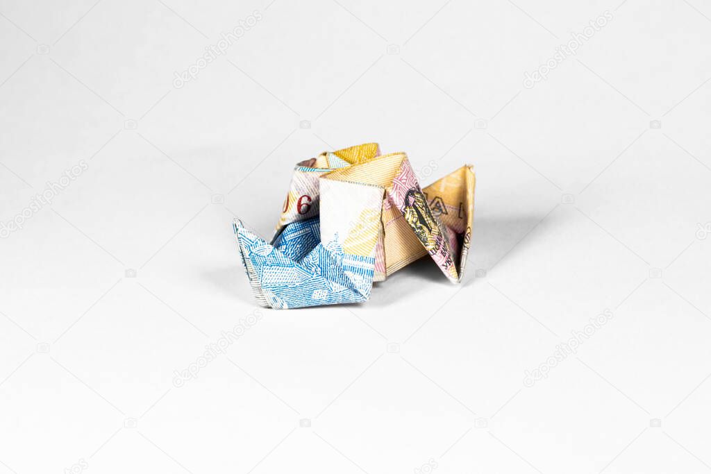 ship made from a paper bill of the Ukrainian hryvnia