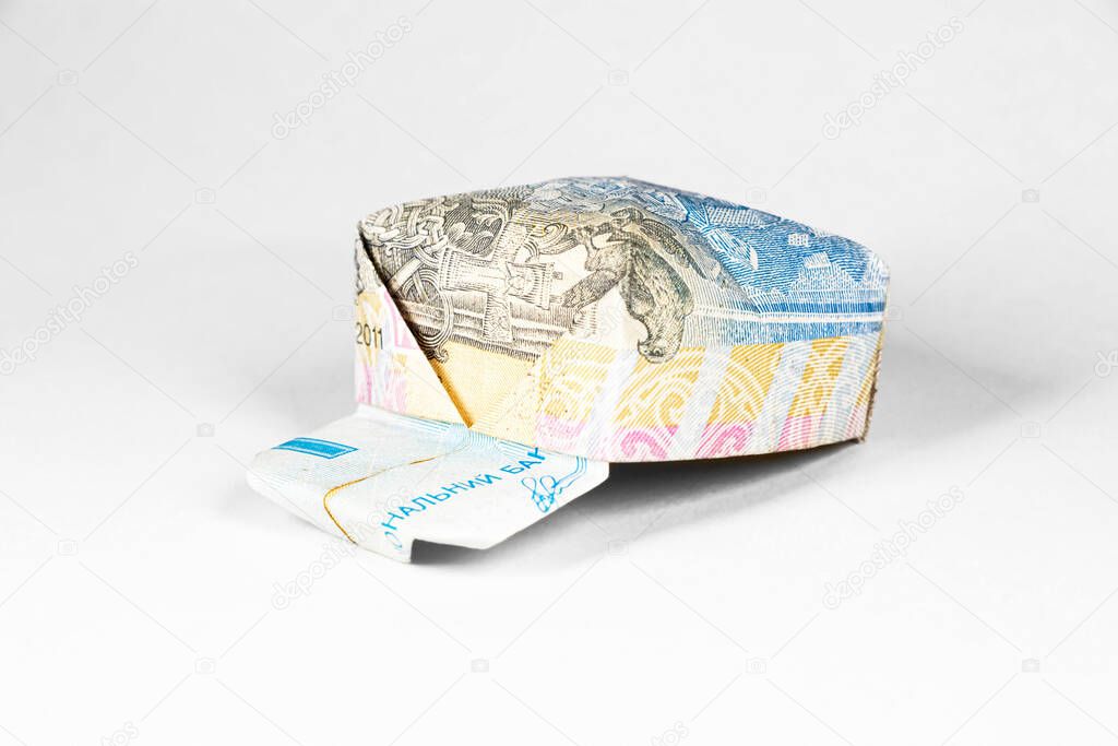 cap made from a paper bill of the Ukrainian hryvnia