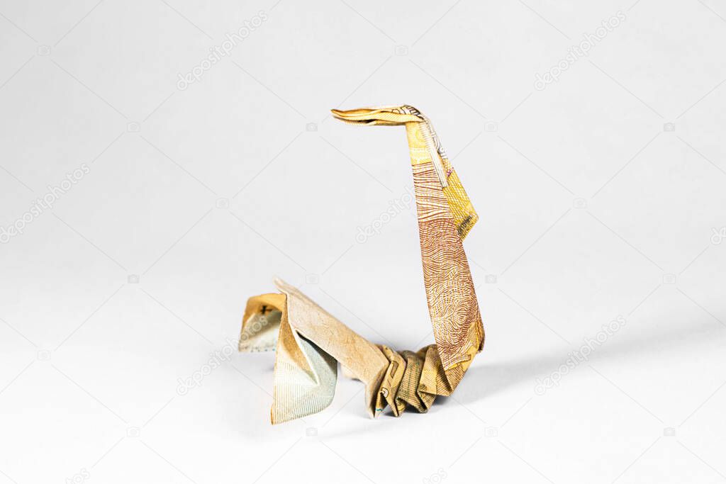 scorpion made from a paper bill of the Ukrainian hryvnia