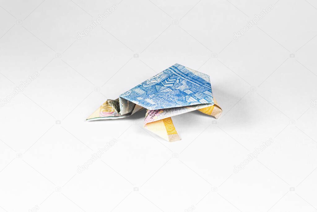 frog made from a paper bill of the Ukrainian hryvnia