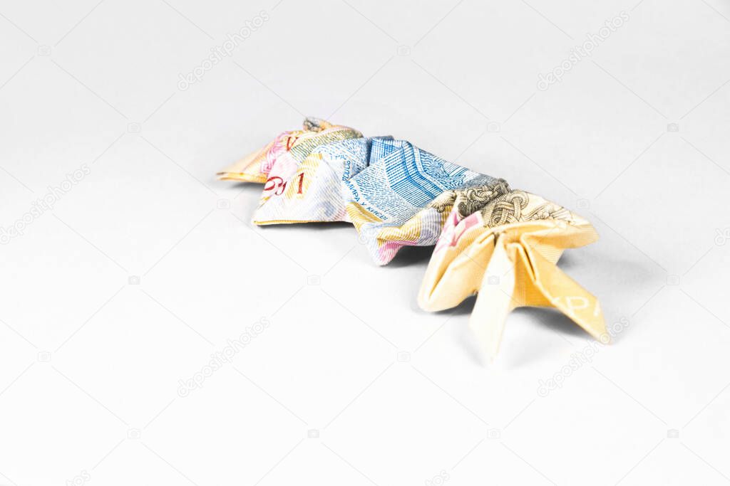 crab made from a paper bill of the Ukrainian hryvnia
