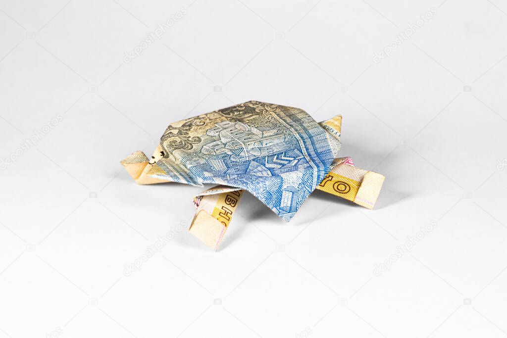turtle made from a paper bill of the Ukrainian hryvnia