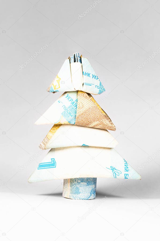 tree made from a paper bill of the Ukrainian hryvnia