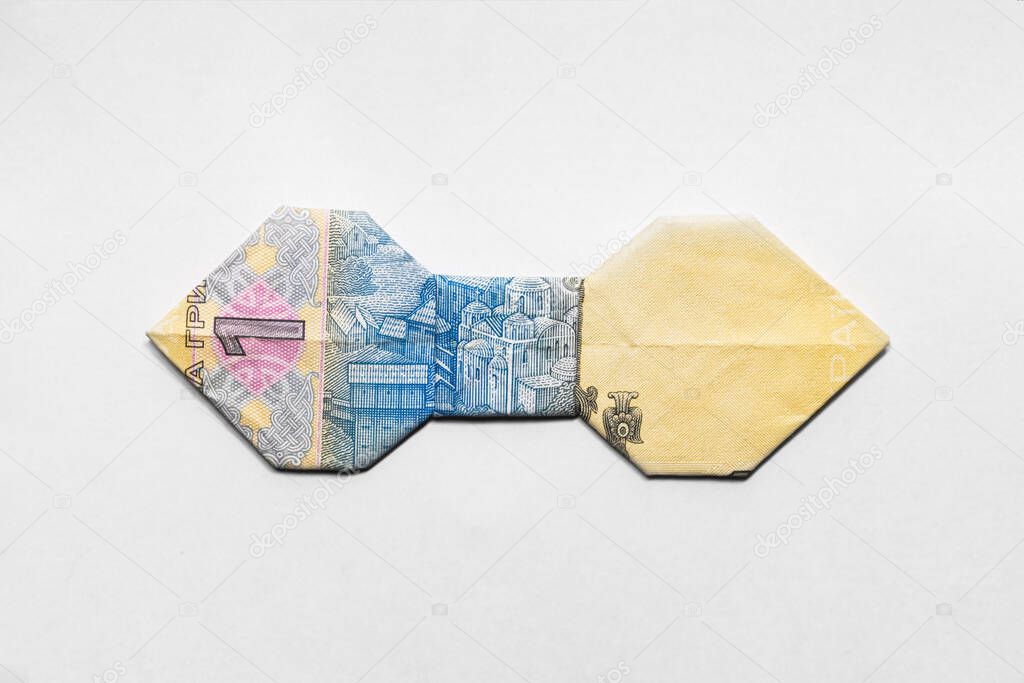bow tie made from a paper bill of the Ukrainian hryvnia