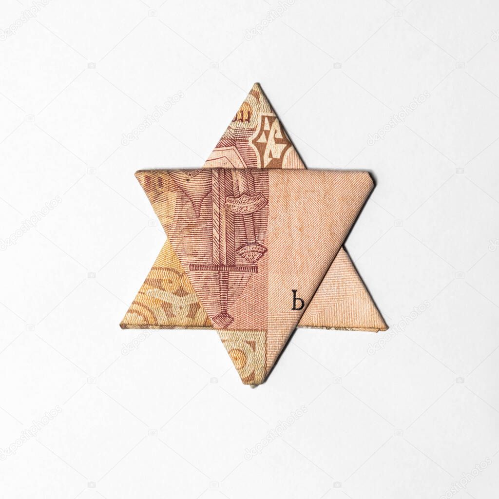 Star of David made from a paper bill of the Ukrainian hryvnia
