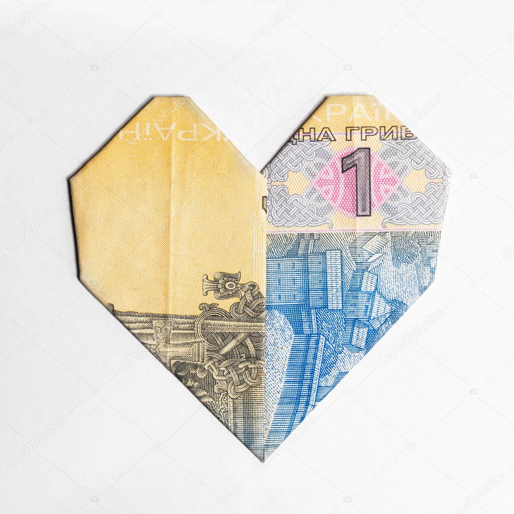 heart made from a paper bill of the Ukrainian hryvnia