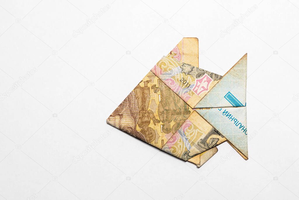 fish made from a paper bill of the Ukrainian hryvnia