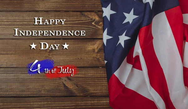 4th of July with Independence Day. American flag on a dark wooden background. USA holiday concept — Stockfoto