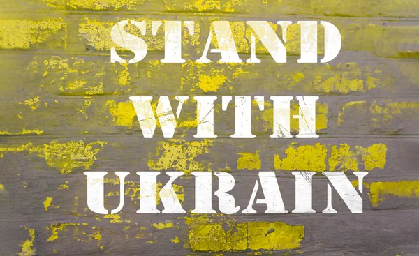 Tekststandaard met Oekraïne op gele grijze bakstenen muur — Stockfoto