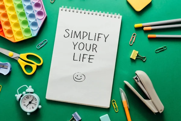 Composition Text Simplify Your Life Pad Surrounded School Supplies Green —  Fotos de Stock