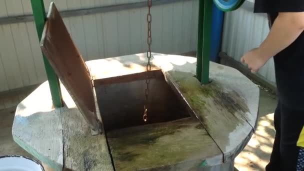 Gardener Gets Metal Bucket Water Out Well Strong Hands Take — Wideo stockowe