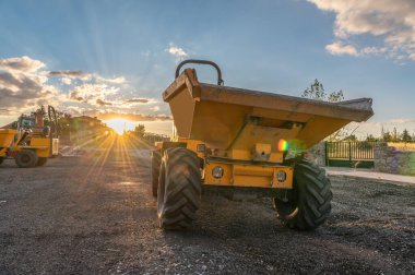 Dump truck at a road construction site